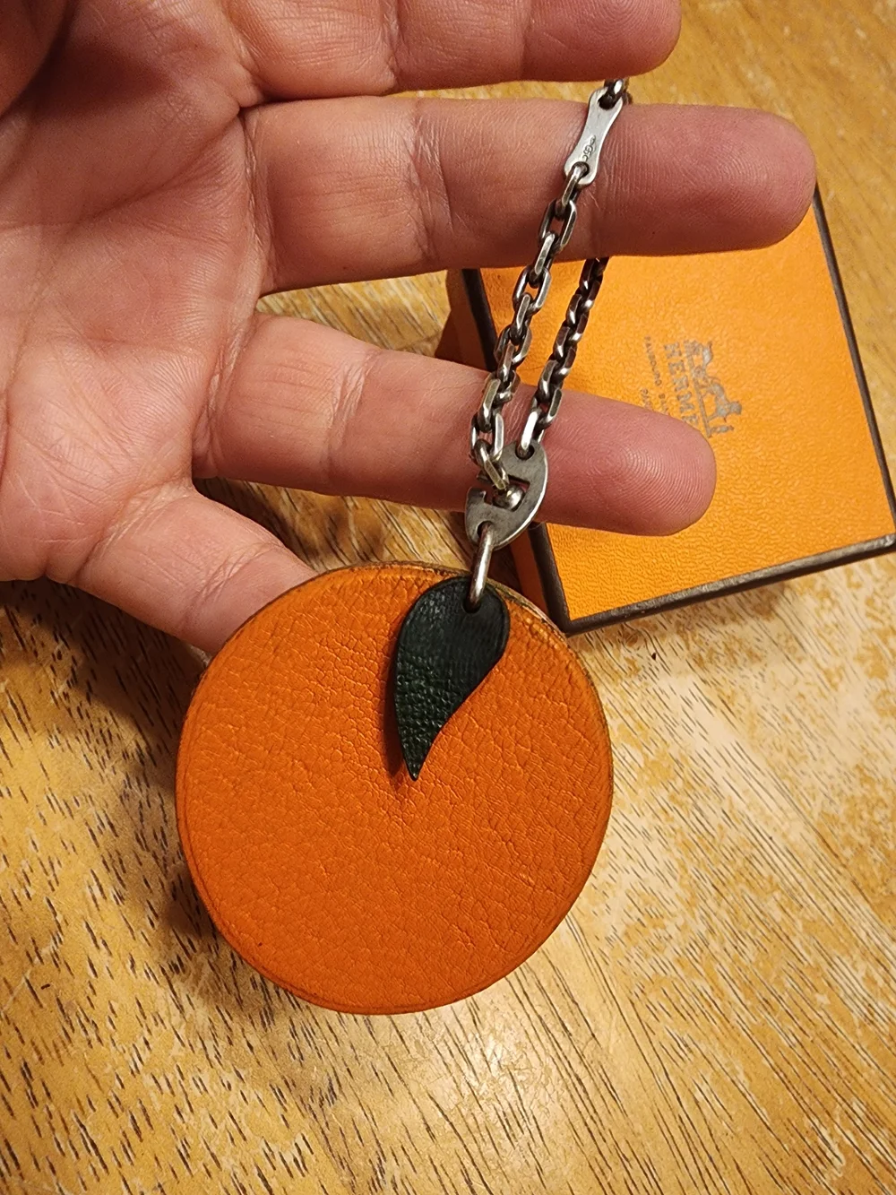 authentic Hermès orange fruit leather bag charm and keychain